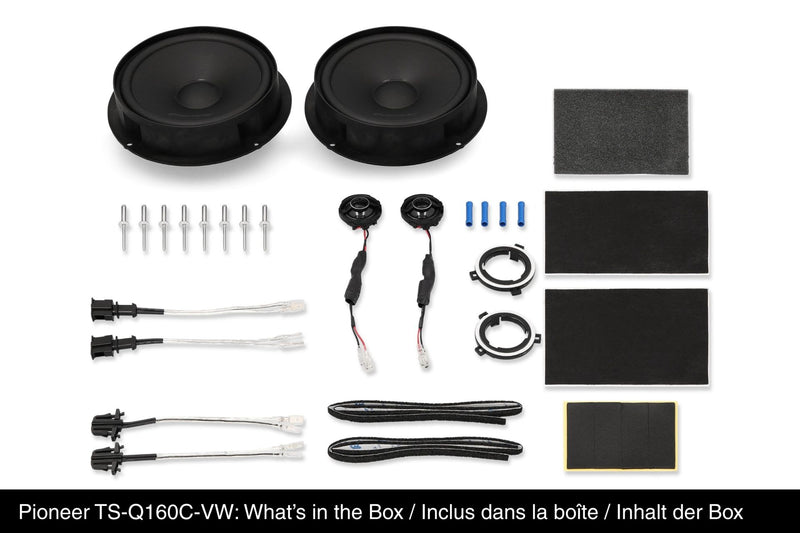 Car audio component kit with speakers, wiring, and mounting materials on a white background