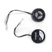 Two JVC car speakers with wiring on a white background