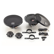 Set of car speakers and related components on a white background