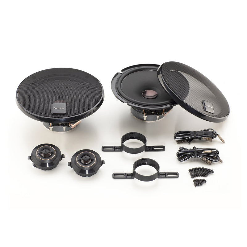 Set of car speakers and related components on a white background