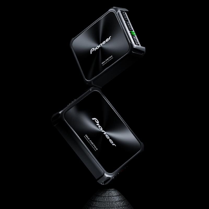 Two Pioneer audio components on a black background