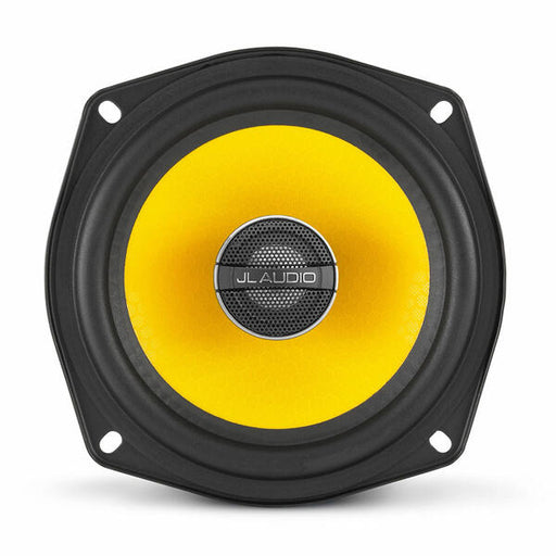 Speaker with yellow cone and black frame on a white background
