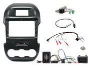 Car stereo headliner installation kit featuring a black plastic dashboard frame with integrated control buttons, wiring harnesses, connectors, a control module, and mounting hardware, displayed on a clean white background.