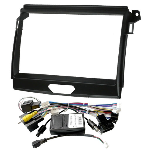 Black double DIN car stereo dashboard console bezel frame kit with wiring harness, RCA connectors, and control module on a white background.