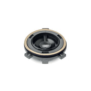 Round metallic component with black center and beige rim on a white background