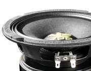 Close-up of a car speaker with a brand logo on a white background