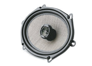 Car speaker with mesh grill on a white background