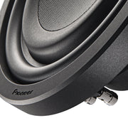 Close-up of a Pioneer car subwoofer on a white background
