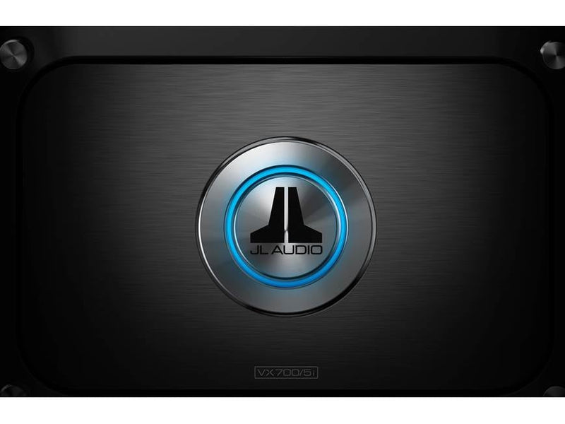 JL Audio amplifier with a blue light on a black background