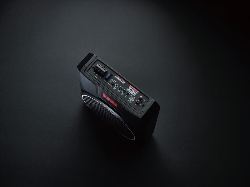 Black portable radio on a dark gray background