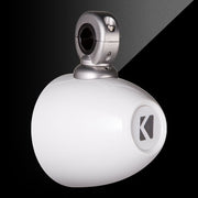 White spherical object with metallic top on a black background