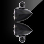 Black motorcycle mirror with a reflective surface on a black background