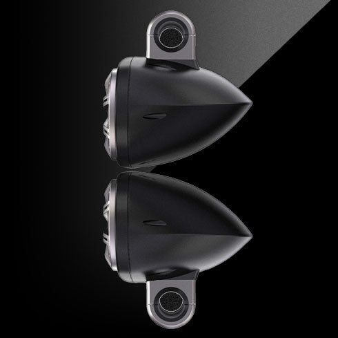Black motorcycle mirror with a reflective surface on a black background