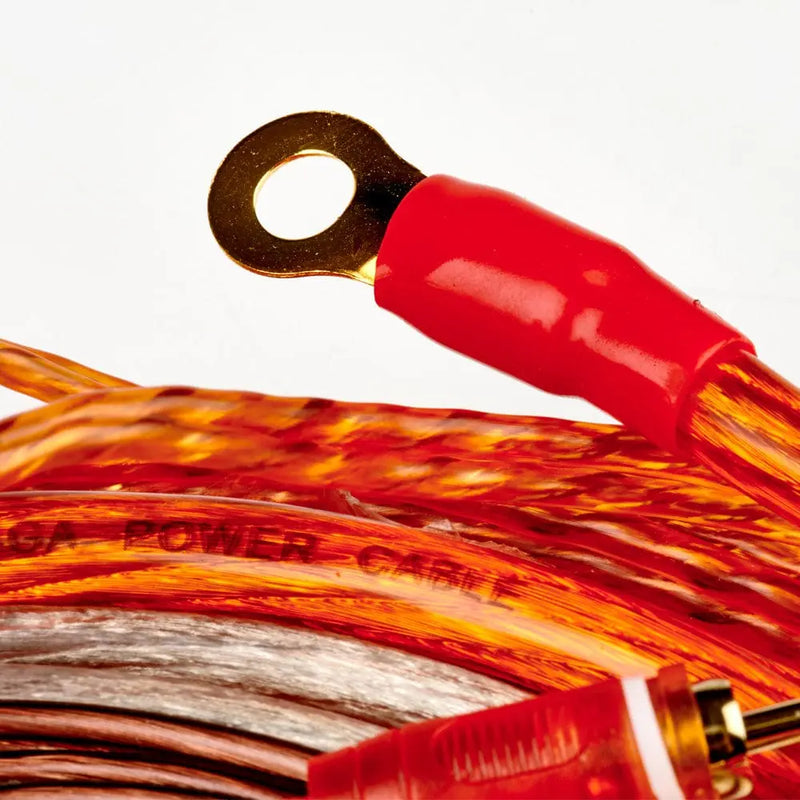 Close-up of a red power cable with gold connectors on a white background