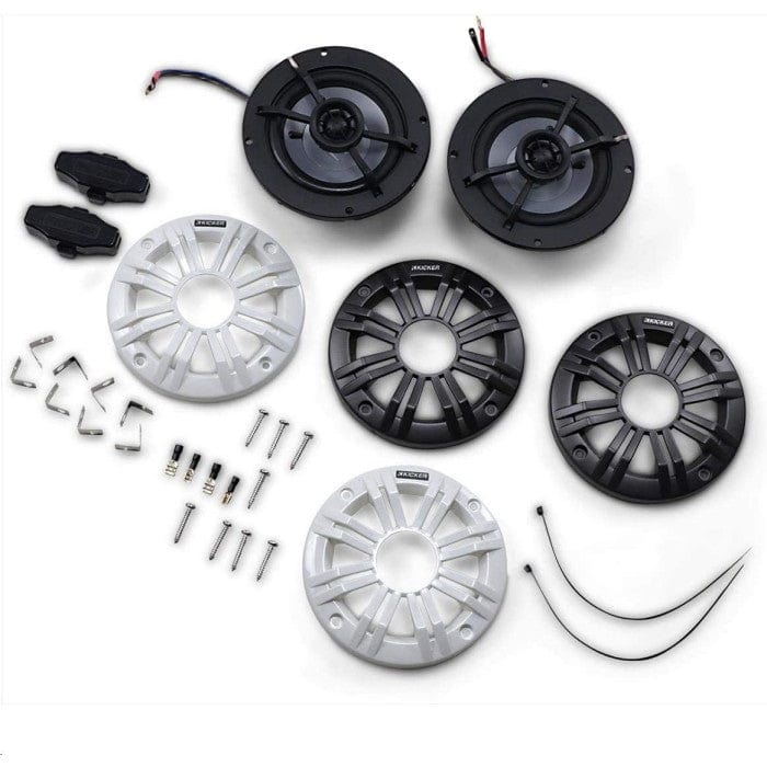Set of car speakers with mounting hardware on a white background