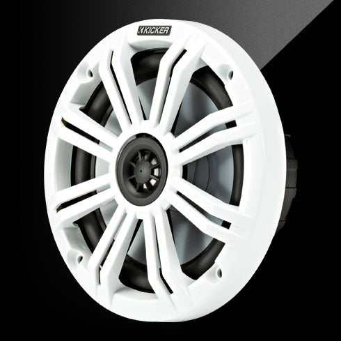 Kicker speaker with white frame and black center on a dark background