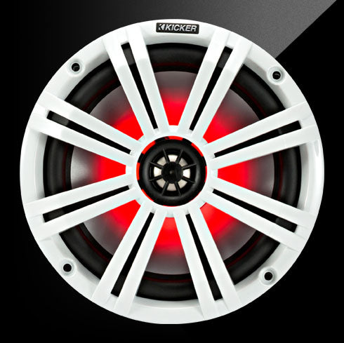 Kicker car speaker with red lighting on a black background