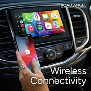 Car dashboard with a touchscreen display and smartphone, featuring Road Angel branding and 'Wireless Connectivity' text.