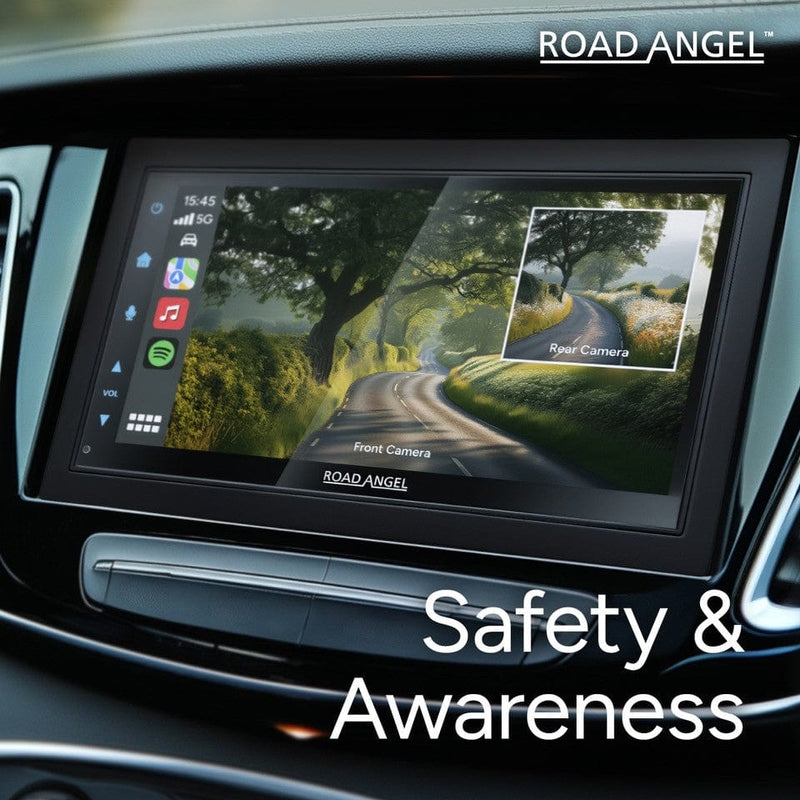 Car dashboard with a Road Angel safety and awareness system display.