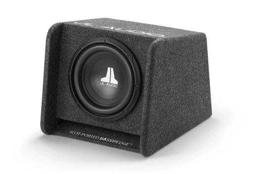 A JL Audio subwoofer in a custom gray carpeted box, shown at a three-quarter angle on a white background.