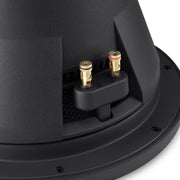 Close-up of a speaker cone with gold and silver connectors on a white background