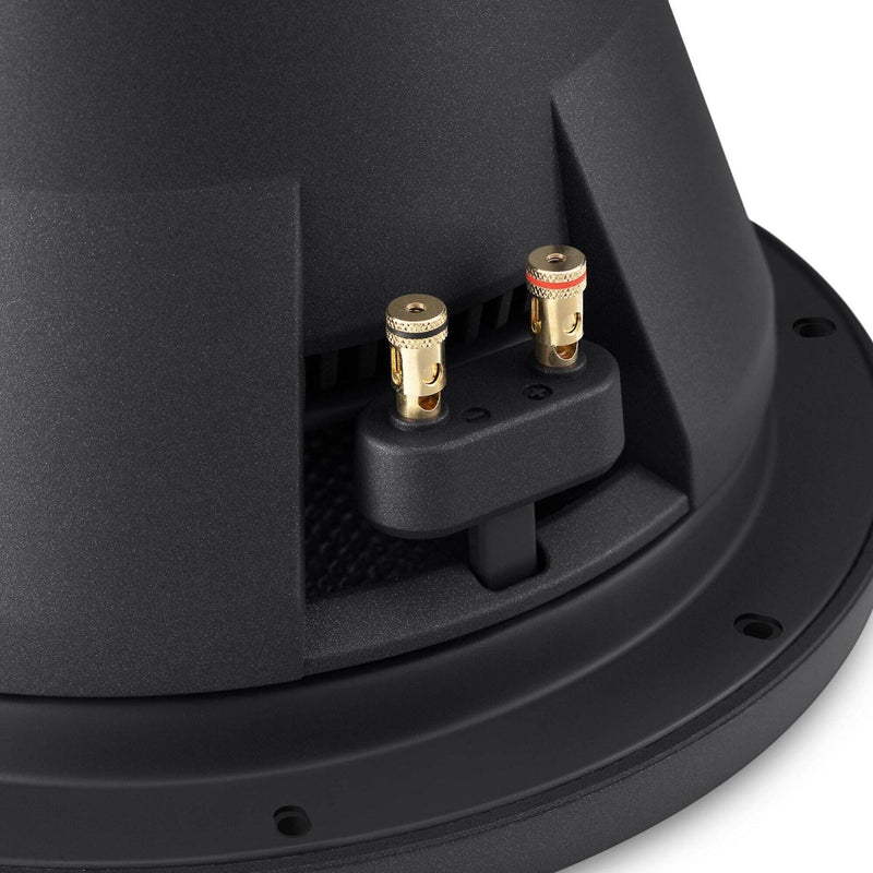 Close-up of a speaker cone with gold and silver connectors on a white background